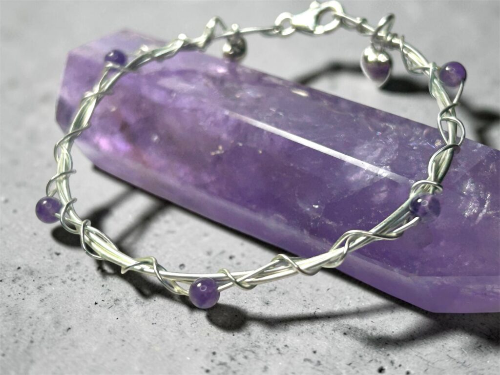 Amethyst and sterling silver twisted bangle style bracelet