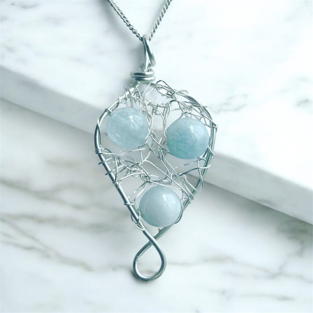 Aquamarine pendant with wire wrapped sterling silver wire