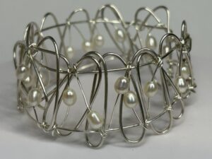 Elegant handmade pearl cuff bangle in sterling silver with freshwater pearls